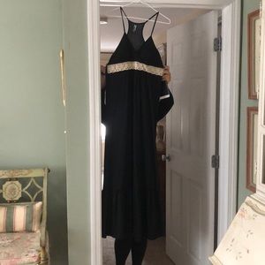 Black maxi dress with cream lace detail.